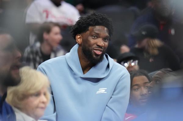 Joel Embiid #21 of the Philadelphia 76ers smiles during the game against the New Zealand Breakers during a NBA Preseason Game on October 7, 2024 at the Wells Fargo Center in Philadelphia, Pennsylvania.
