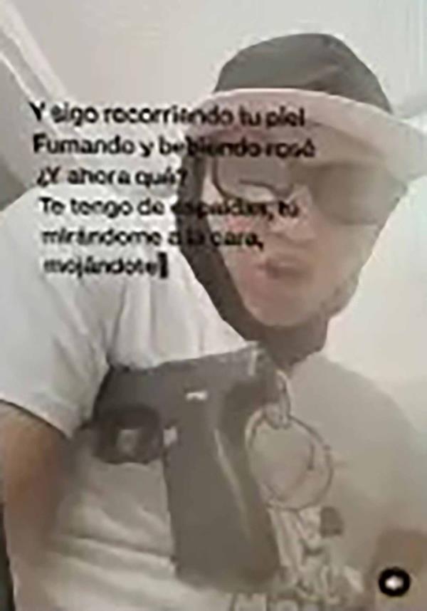 Diego Ibarra posing with a gun 