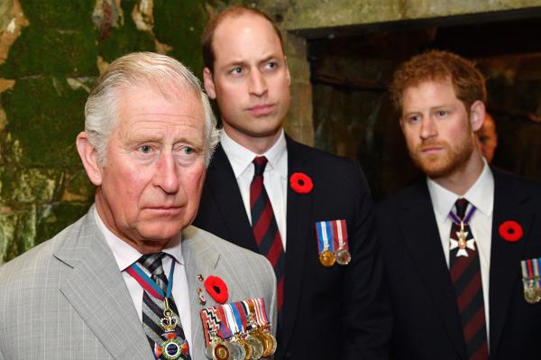 Charles, William and Harry are seen together in 2017. 