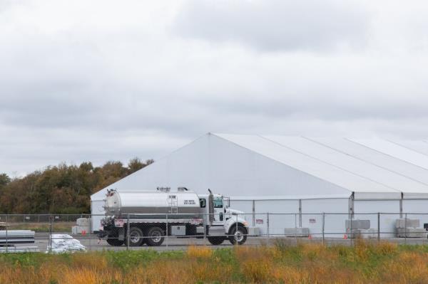 Co<em></em>nstruction Crews Build Shelters For Migrants At Floyd Bennett Field 