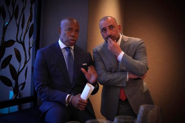 Mayor Adams and Carone have long been friends.
