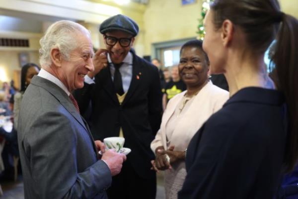 King Charles III talking to Jay Blades (left) during his 75th birthday party at Highgrove Gardens in Tetbury on the eve of his birthday, with community champions who are also celebrating turning 75 in 2023. Picture date: Mo<em></em>nday November 13, 2023. PA Photo. See PA story ROYAL King. Photo credit should read: Chris Jackson/PA Wire