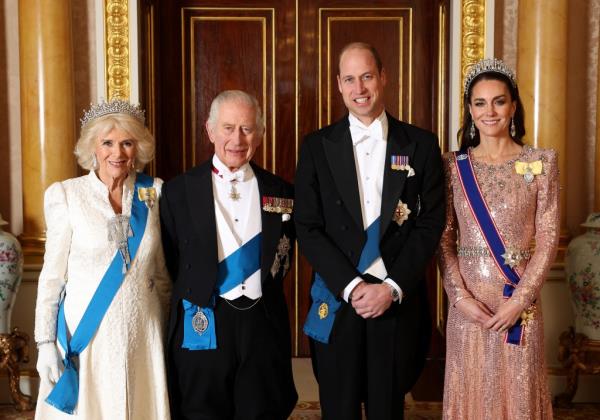 Britain's Queen Camilla, King Charles III, William, Prince of Wales and Catherine, Princess of Wales pose for a photo at Buckingham Palace on Dec. 5. 