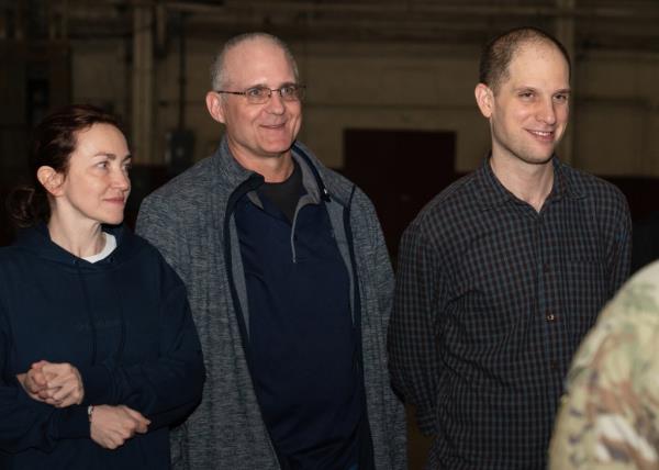 Gershkovich is seen far right alo<em></em>ngside freed Americans Paul Whelan (center) and Alsu Kurmasheva (far left).