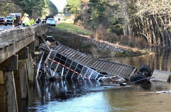 The overturned semi-truck.