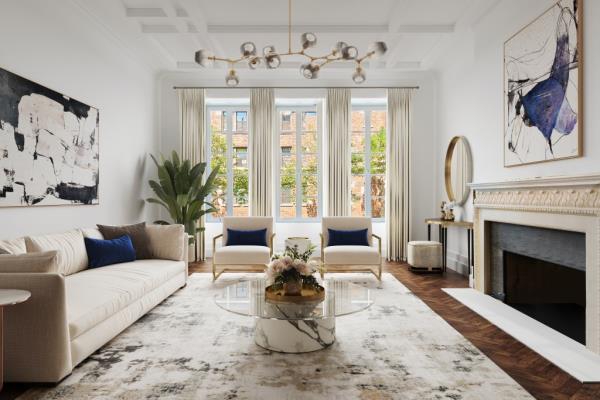 A fireplace anchors this stylish living area.