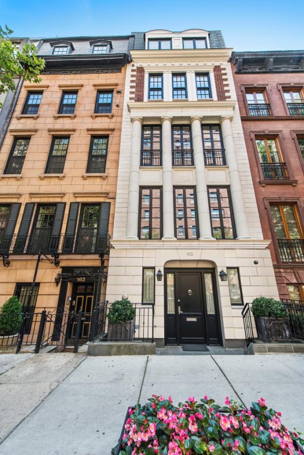 New York City limestone mansion located at 160 East 83rd Street, available for sale at $18.5 million