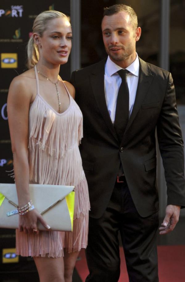 This Nov. 4, 2012 photo shows Oscar Pistorius and girlfriend Reeva Steenkamp at an awards ceremony in Johannesburg, South Africa. 