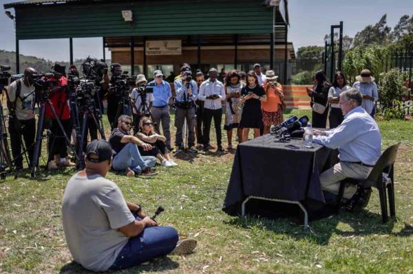 Rob Matthews (right), spokesperson for June Steenkamp, Reeva Steenkamp's mother, speaks to the media at the Atteridgeville Correctio<em></em>nal Centre in Pretoria on Nov. 24, 2023. 