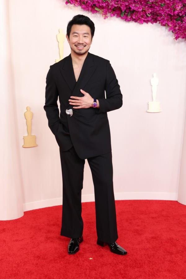 Simu Liu attends the 96th Academy Awards