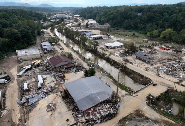 An aerial view of flood damage wrought by Hurricane Helene along the Swannanoa River in Asheville, NC