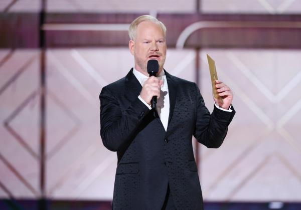 Jim Gaffigan talking into a mic. 