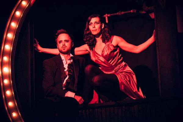 Aaron Paul and an actress in 