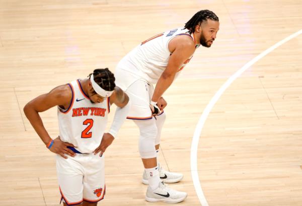Jalen Brunson #11 of the New York Knicks reacts on the court along side Miles McBride #2 of the New York Knicks during the fourth quarter in Game 6.