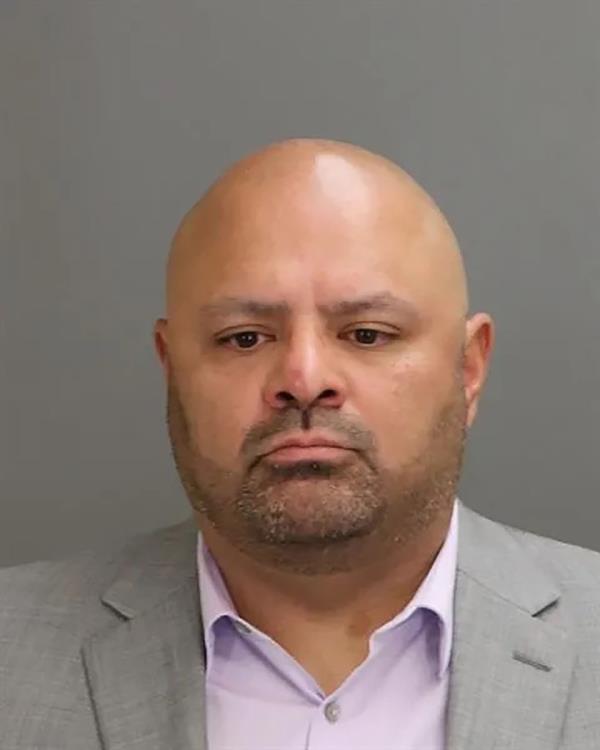 Mugshot of Officer Matthew Rodriguez.