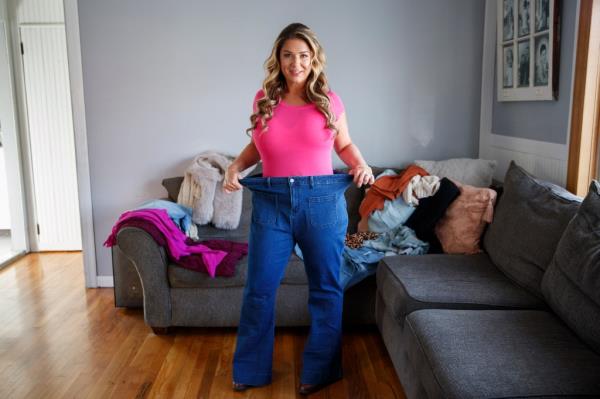 Dina Pattelli , 43, in a pair of her old jeans. 