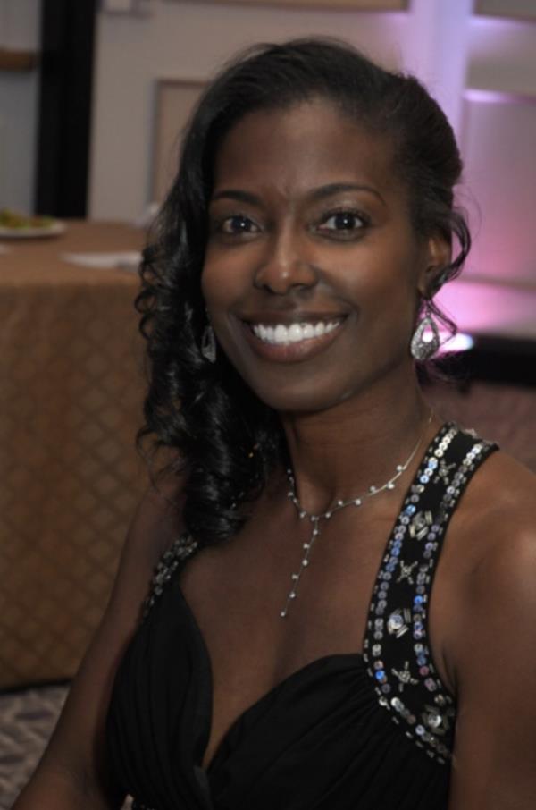 Joycelyn Yvo<em></em>nne Wade, estranged wife of Nathan Wade, smiling at camera. 