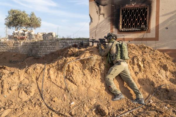 Israel's military said 10 soldiers were killed in Gaza fighting on Tuesday, including a colo<em></em>nel who had commanded a forward ba<em></em>se for the Golani infantry brigade.