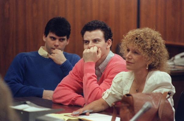 Erik Menendez (C) and his brother Lyle (L) are pictured, on August 12, 1991 in Beverly Hills.