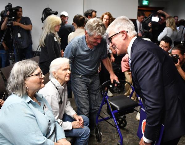 Los Angeles District Attorney George Gason meets the sisters of Kitty Menendez and members of the Menendez Family.