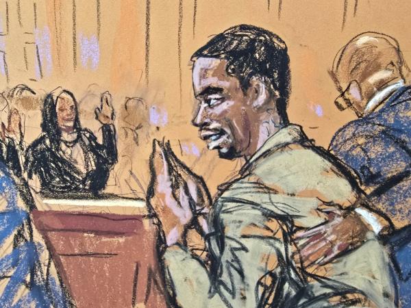 Sean 'Diddy' Combs' bows and waves back to friends and family 