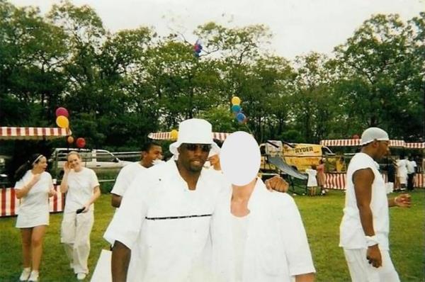 Sean 'Diddy' Combs is seen draping his arm around a 16-year-old boy 