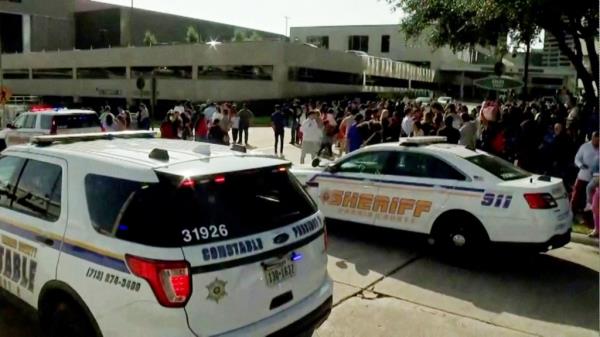 Law enforcement vehicles are parked outside the evacuated Lakewood Church of television evangelist Joel Osteen