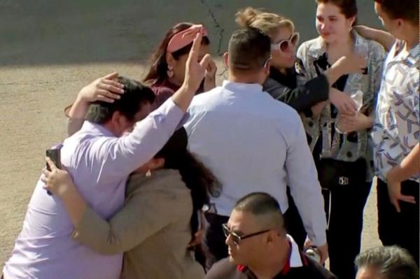 Evacuated parisho<em></em>ners react outside television evangelist Joel Osteen's Lakewood Church 