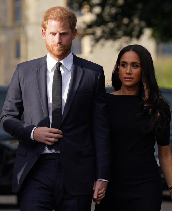 Britain's Prince Harry and Meghan, Duchess of Sussex on the long Walk at Windsor Castle.