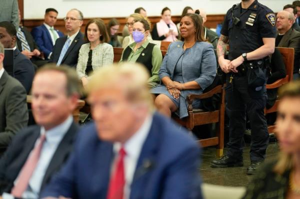Do<em></em>nald Trump seated in the courtroom.