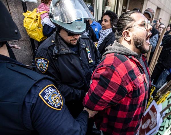Pro-Palestinian protestor being arrested outside Columbia University during a protest in 2024