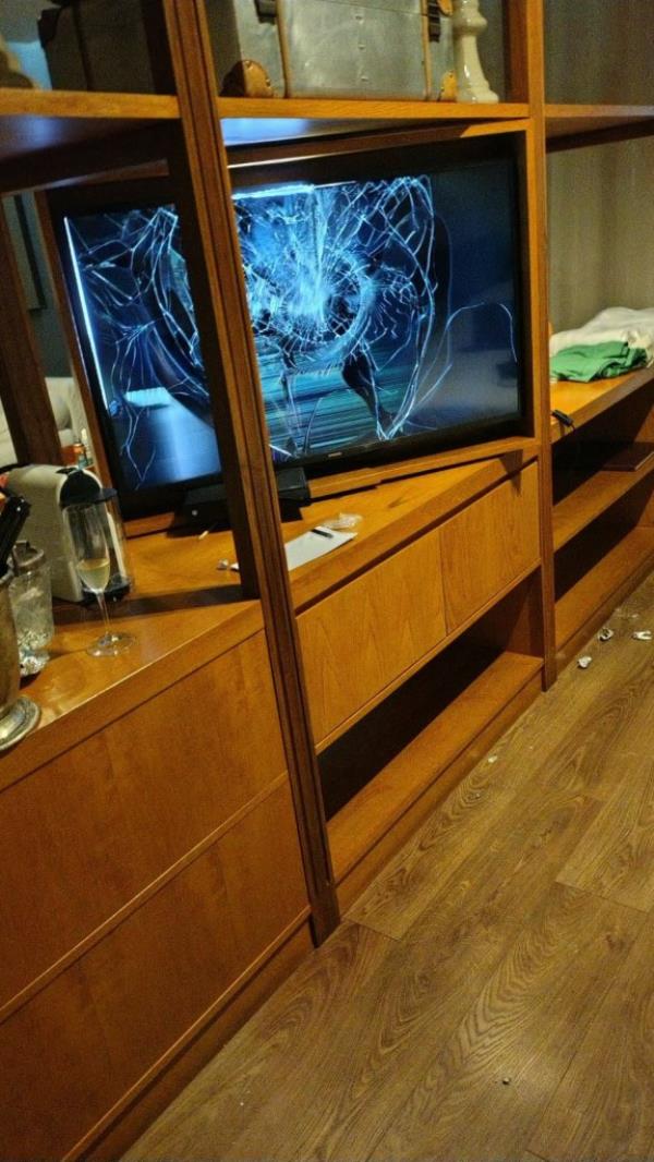 A photo released by Buenos Aires Police shows a TV with a broken screen and a half-full glass of champagne at the hotel room wher<em></em>e  Liam Payne was staying in Buenos Aires on October 16, 2024 before he died.