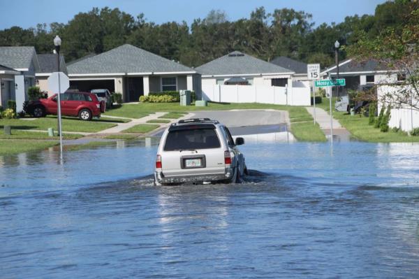 Car floating in water.