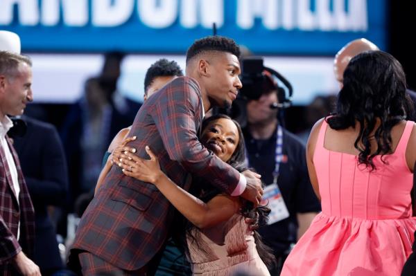 Brandon Miller celebrates after being drafted second overall pick by the Charlotte Hornets.