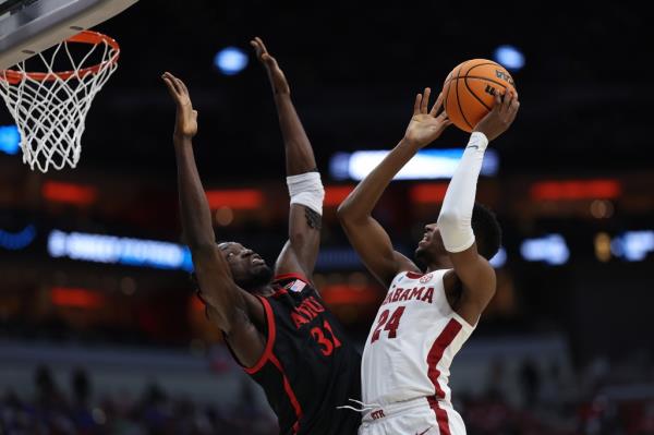 Miller shoots during the first half in the Sweet 16 round of the NCAA Men's Basketball Tournament.