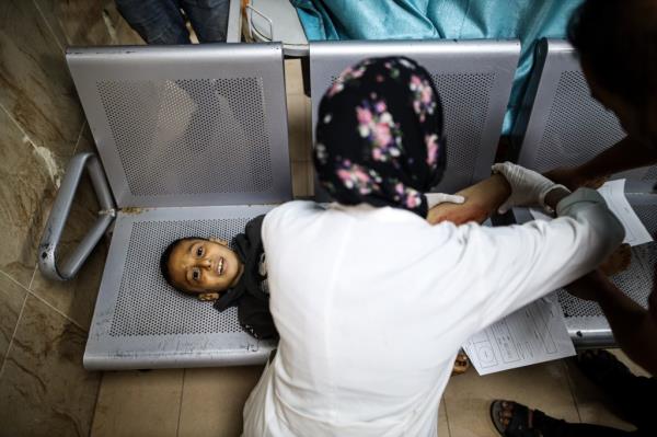 A child injured in Israeli raids on the central Gaza Strip is treated at the Al-Aqsa Martyrs' Hospital in Deir Al-Balah.