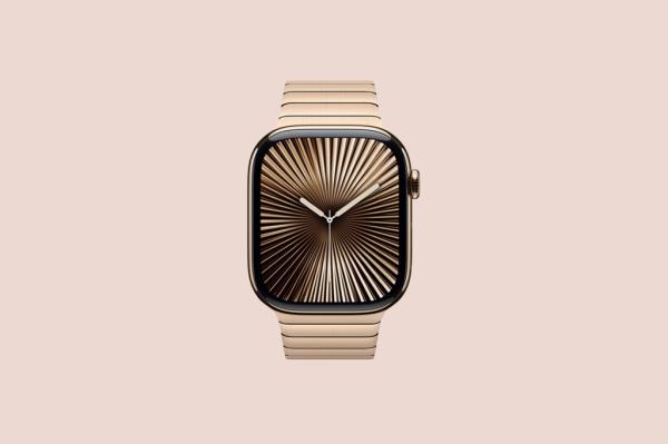 Genesis Rodriguez wearing a gold watch with a black face