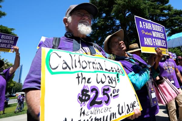 Retirees rally against budget cuts and protest for $25 minimum wage healthcare law in California on June 11, 2024.