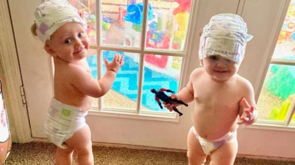 The twins' heartbroken mother warns parents that cedar toy chests become air tight and soundproof when closed