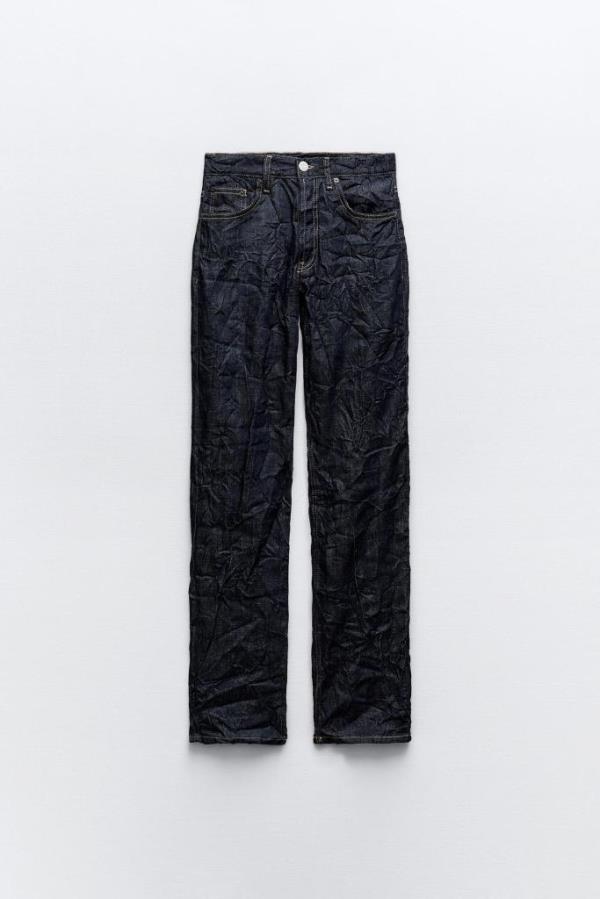 Black creased-wash mid-rise jeans with five pockets and a me<em></em>tal button fastening, sold by Zara.