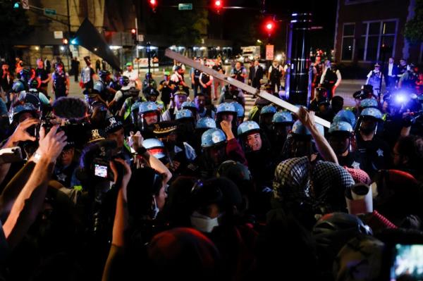Police officers clashed with demo<em></em>nstrators during a protest outside of the DNC on August 22, 2024.