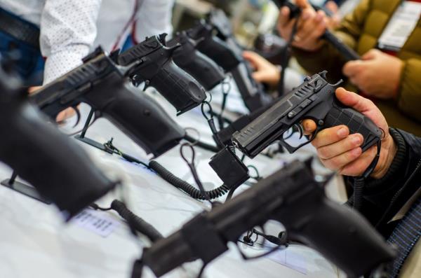 Gun Display Stands. Pistols for sale in the store.