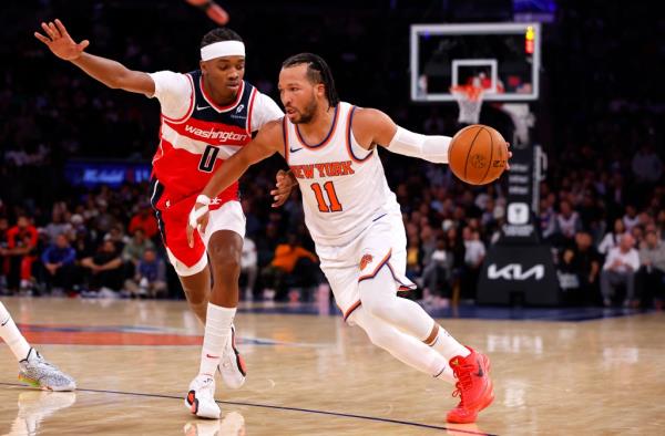 Jalen Brunson drives on Bilal Coulibaly during the Knicks preseason win over the Wizards. 