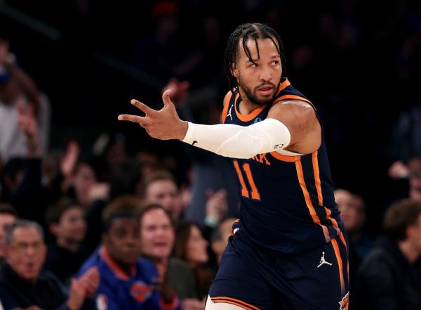Jalen Brunson #11 of the New York Knicks celebrates his three point shot during the first half against the Detroit Pistons.