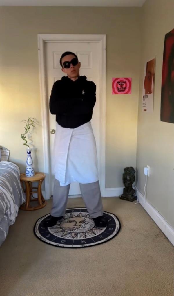 Will Kayson, co<em></em>ntent creator from Maryland, mocking the $925 Balenciaga towel skirt