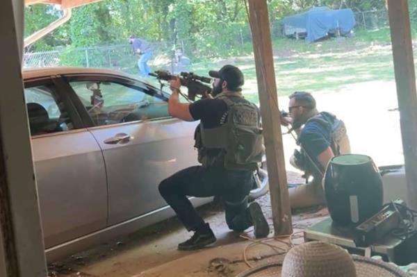 Dramatic video has emerged of the moment a shootout broke out in Charlotte, North Carolina on Mo<em></em>nday that slaughtered four law enforcement officers.