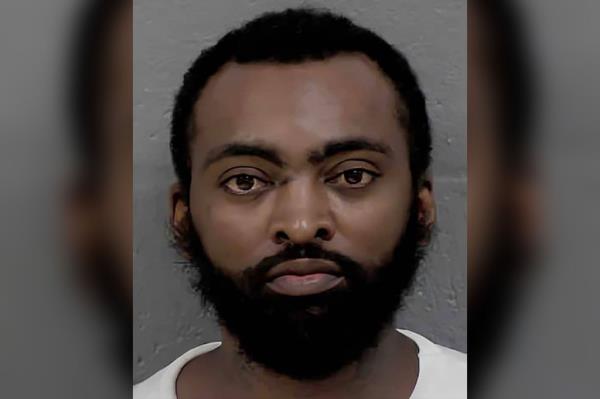Four officers were gunned down in a hail of bullets after the wanted suspect, Terry Clark Hughes Jr, 39, opened fire on them outside the home in Charlotte on Mo<em></em>nday afternoon, cops said.