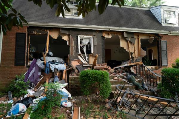 Armored vehicles subsequently smashed into the home, ripping off windows and entire doorways that were left broken.