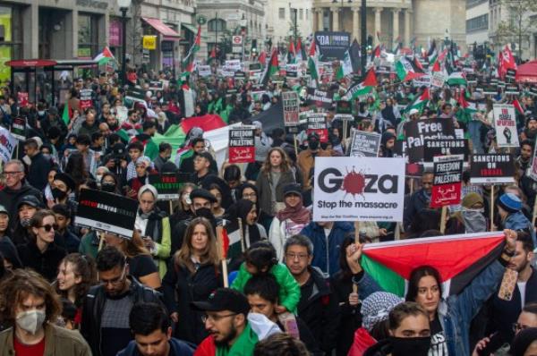 LONDON, ENGLAND - OCTOBER 14: Demo<em></em>nstrators march from the BBC in Portland place to Downing street on October 14, 2023 in London, United Kingdom. Groups supporting Palestine protest at Israel's retaliation to Hamas attacks across the UK this weekend despite the Home Secretary, Suella Braverman, suggesting that waving Palestinian flags and using popular pro-Palestine slogans could be illegal under the Public Order Act in a letter she sent to police chiefs in England and Wales on Tuesday. (Photo by Guy Smallman/Getty Images)