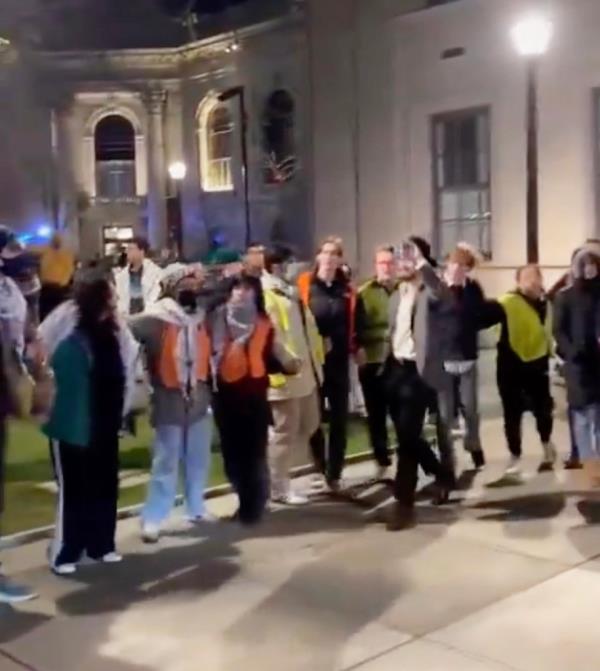 The demo<em></em>nstrators allegedly formed a circle around two Jewish students as they chanted and jeered at them.
